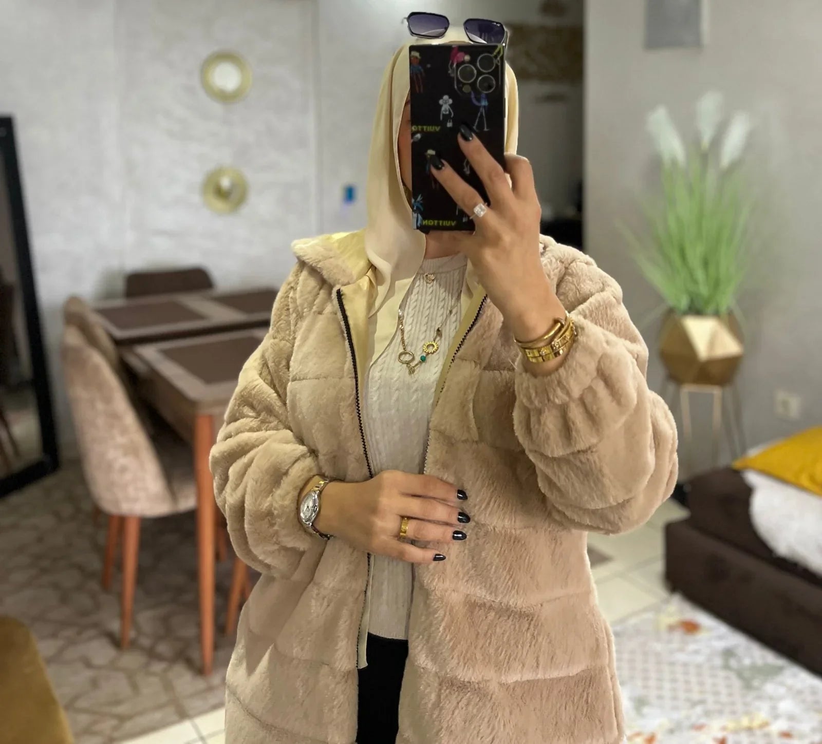 Manteau à capuche en fourrure