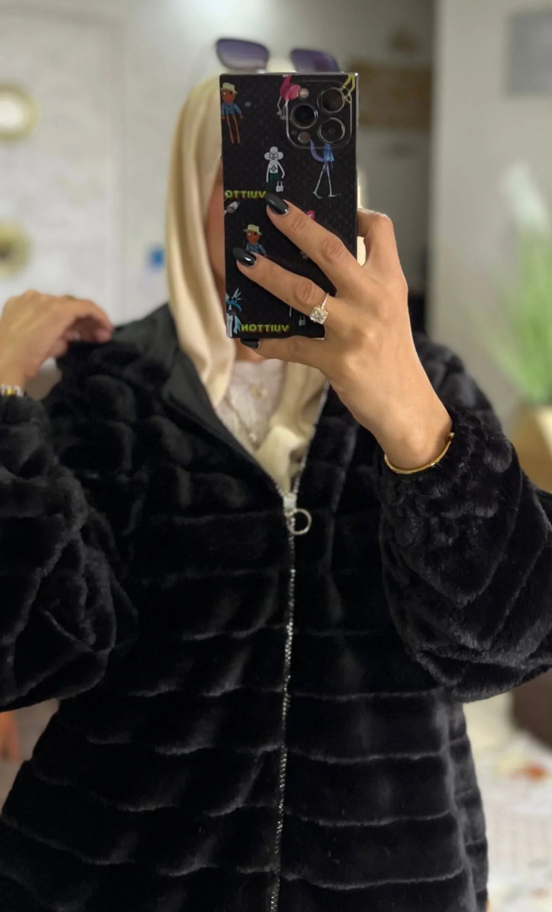 Manteau à capuche en fourrure