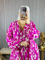 Robe cloche à manches bouffantes