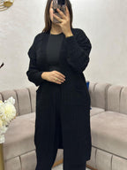 Cape en laine à poches